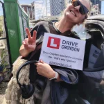 Drive Croydon learner holding a driving test pass certificate